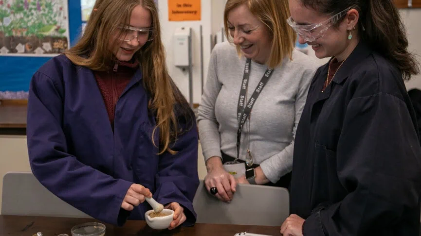 becky teaching in the biology lab