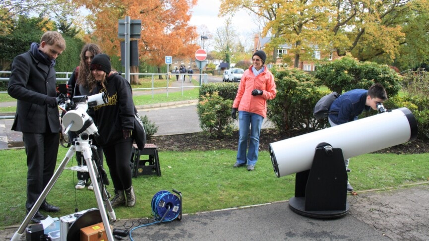 Period 6 Physics Lesson Students Look Through A Telescope Outside The College Front