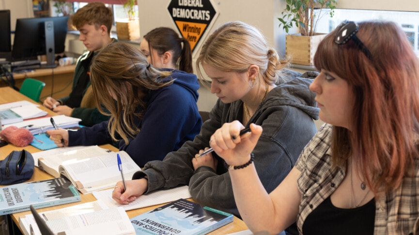 Politics class with students working at desks