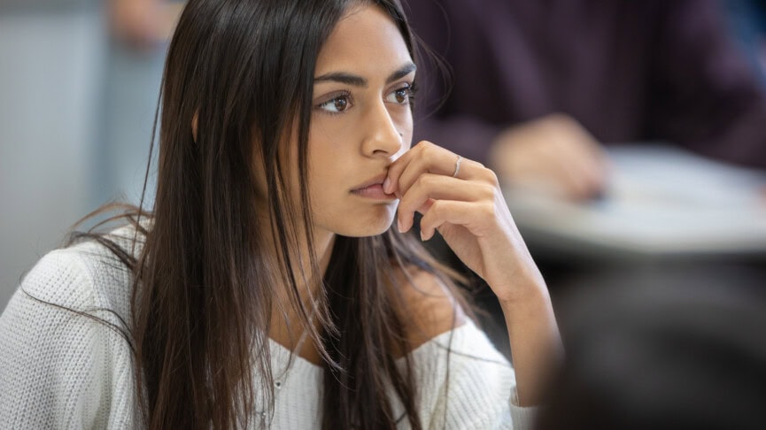 female student in economics class