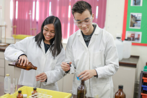 Boy and girl in chemistry lab