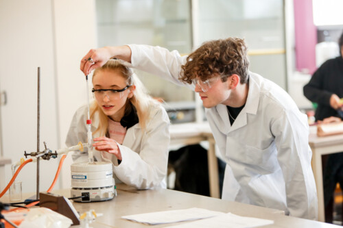 Chemistry Classroom Boy And Girl Experiment