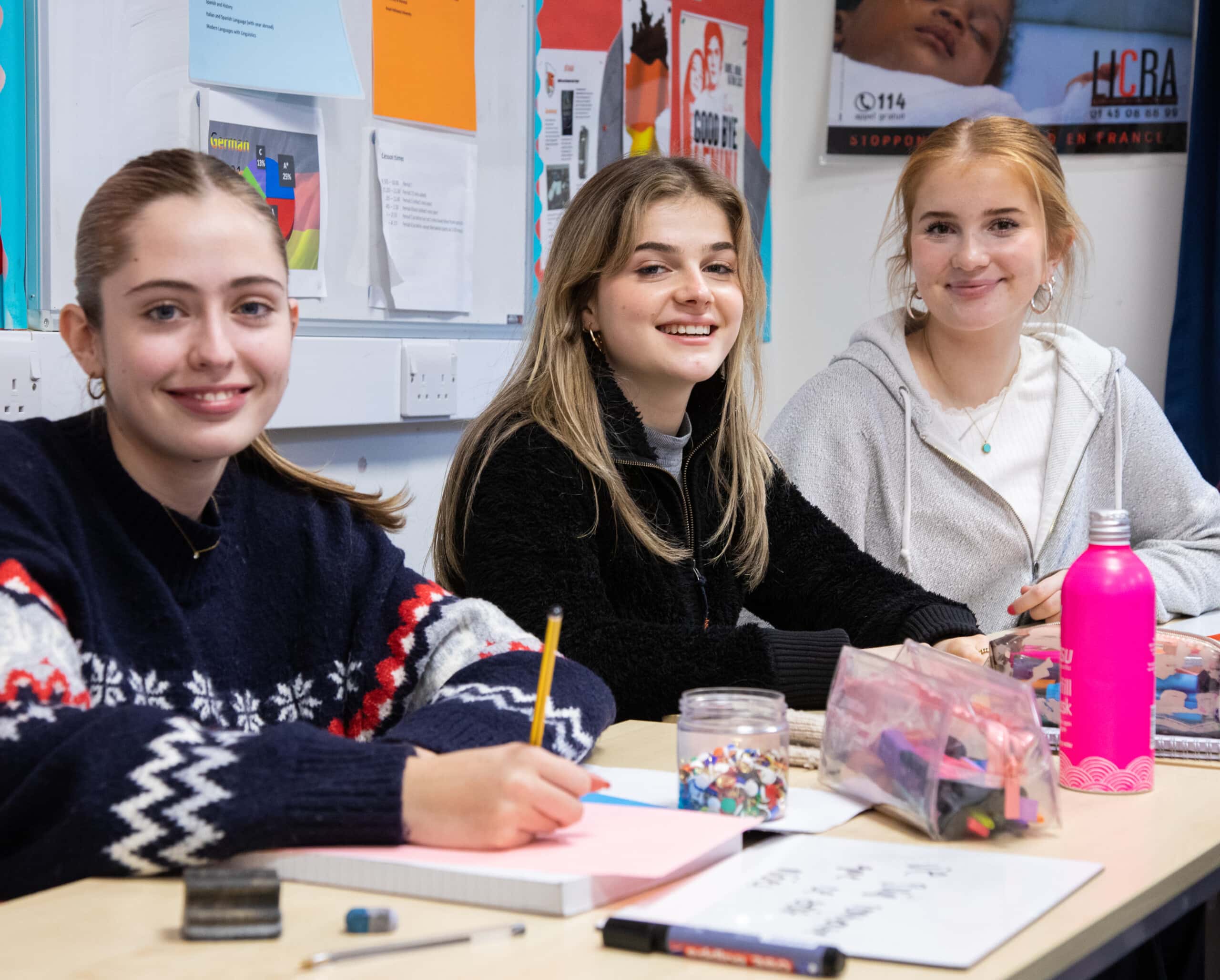 Three female students in French class