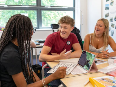 a group of students enjoying a sociology lesson