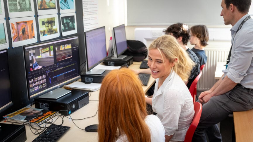 two female students working in front of production software