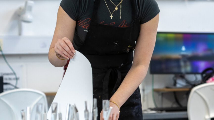 a female art student screen printing