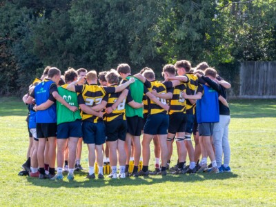 Rugby players in a huddle