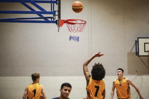 Esher Men Playing Basketball