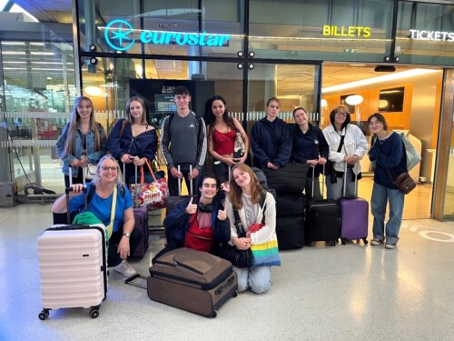 A group of students with luggage at the Eurostar terminal