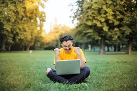 Happy student at computer