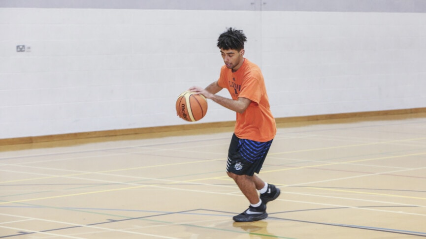 Man Playing Basketball