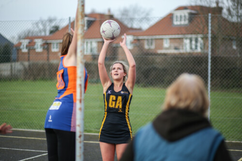 GA shooting ball at netball hoop