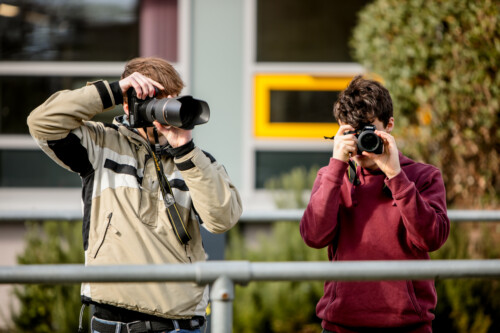 Two Boys With Cameras
