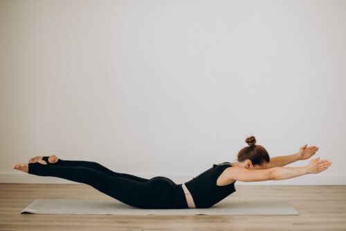 Woman doing Pilates At Gym