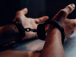 Hands In Cuffs