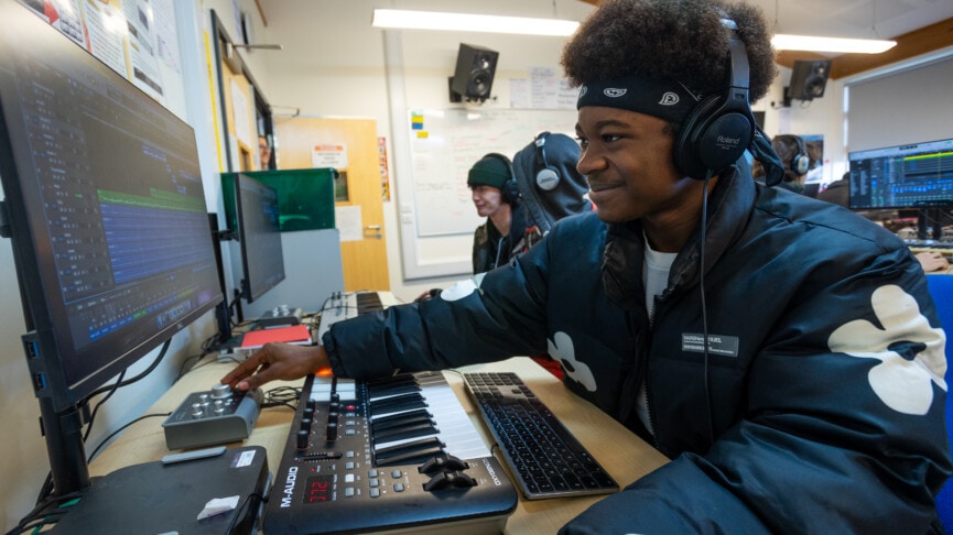 music tech student in puffa jacket