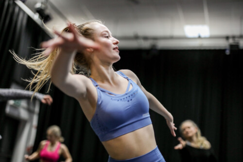 Girl dancing in College theatre