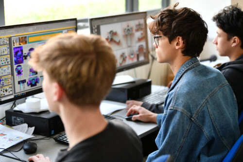 Boy at computer using CAD design