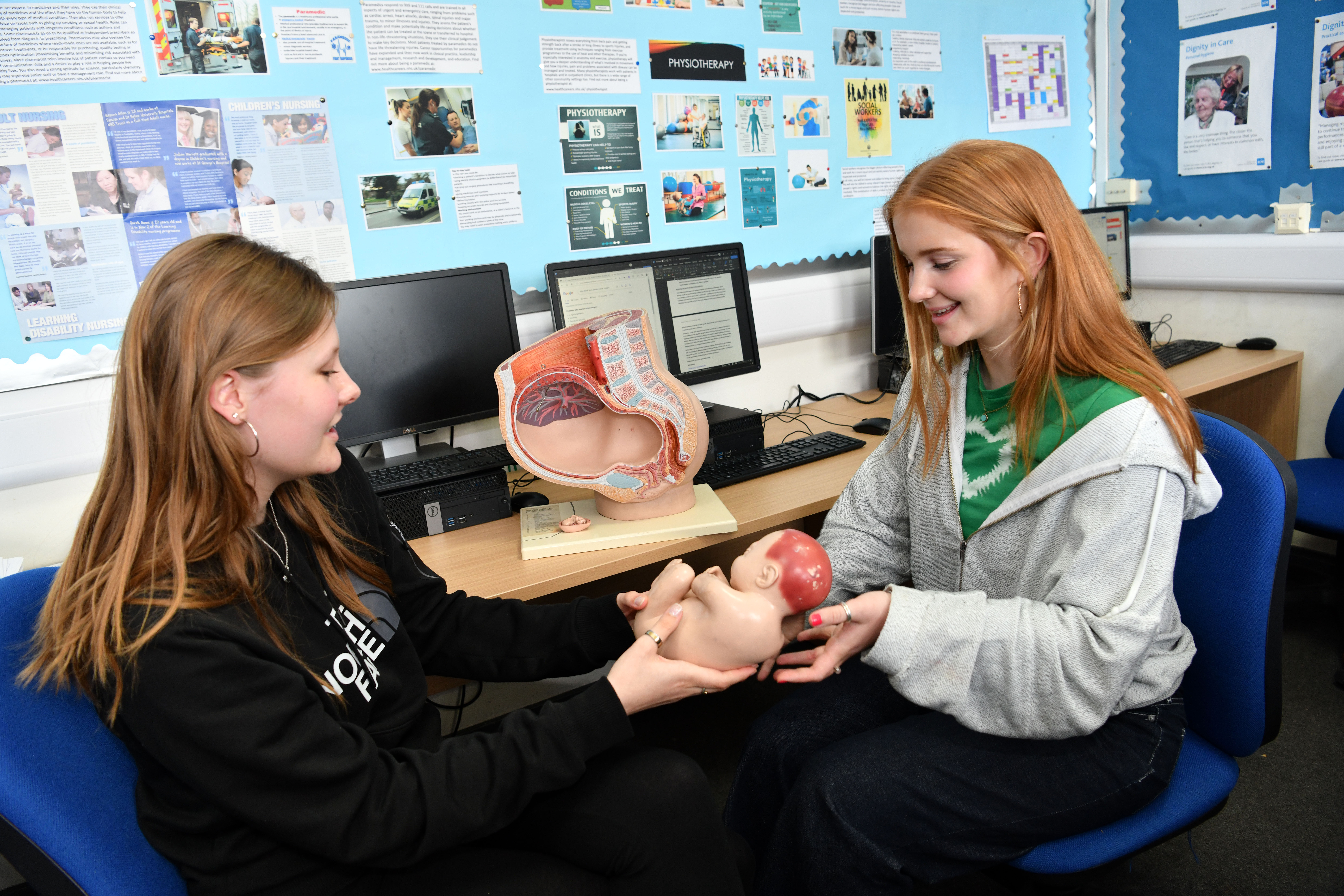 Heath & Social care students with baby