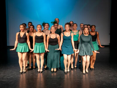 Performing arts troupe on stage