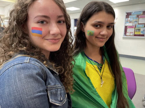 two girls on culture day at college with facepaint