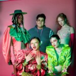 Fashion Graduate and Esher Alumni, Demitris Zacharia, with models wearing his design collection