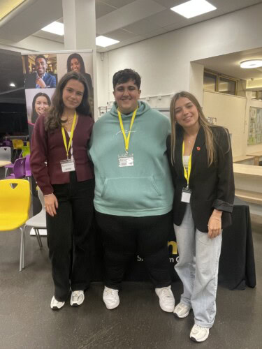Three Alumni students at the Welcome to Esher event