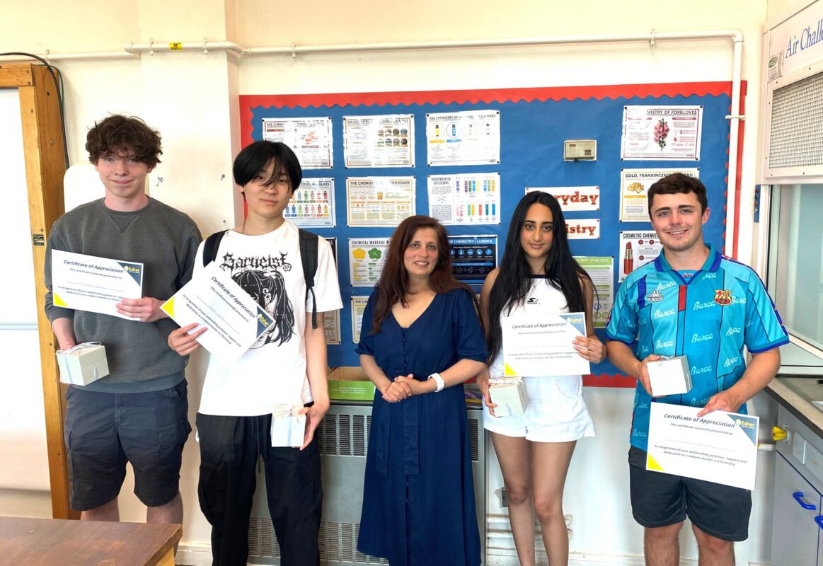 Chemistry mentors with chemistry teacher Seema Maden