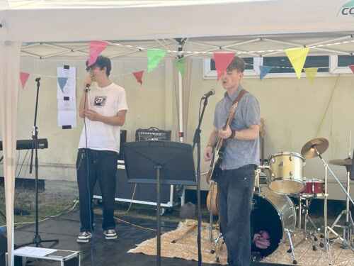 a band playing at the summer festival