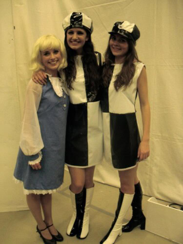 Students backstage a the college production of Alice