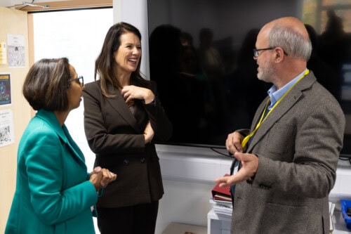 Monica Chatting with a trustee