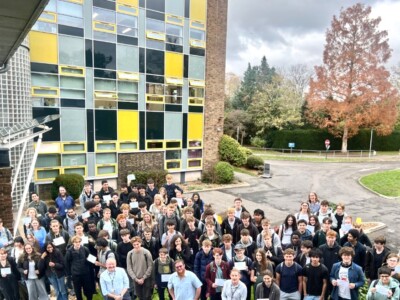 group of maths students standing out the front of the College
