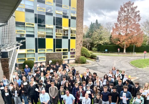 group of maths students standing out the front of the College
