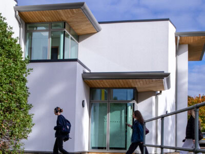 New Building With Students Walking across