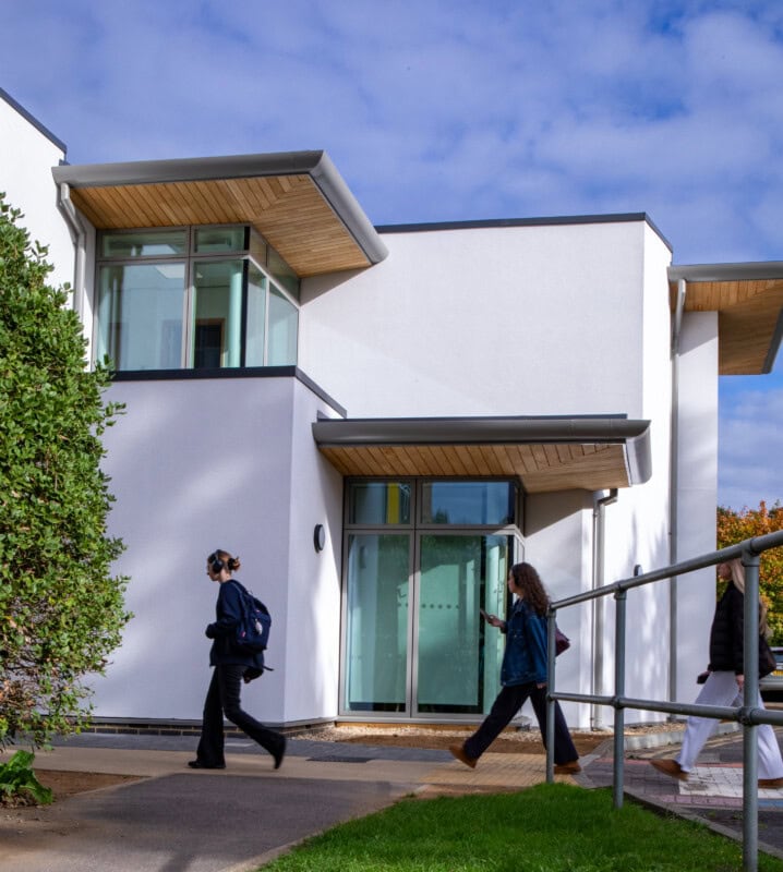 New Building With Students Walking across