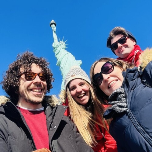 4 Sociology Teachers in front of the statue of liberty