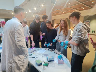 Checking Out The Equipment at Biology COnference