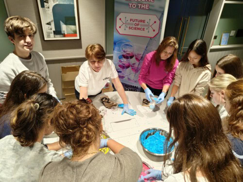 students doing a biology experiment at a conference