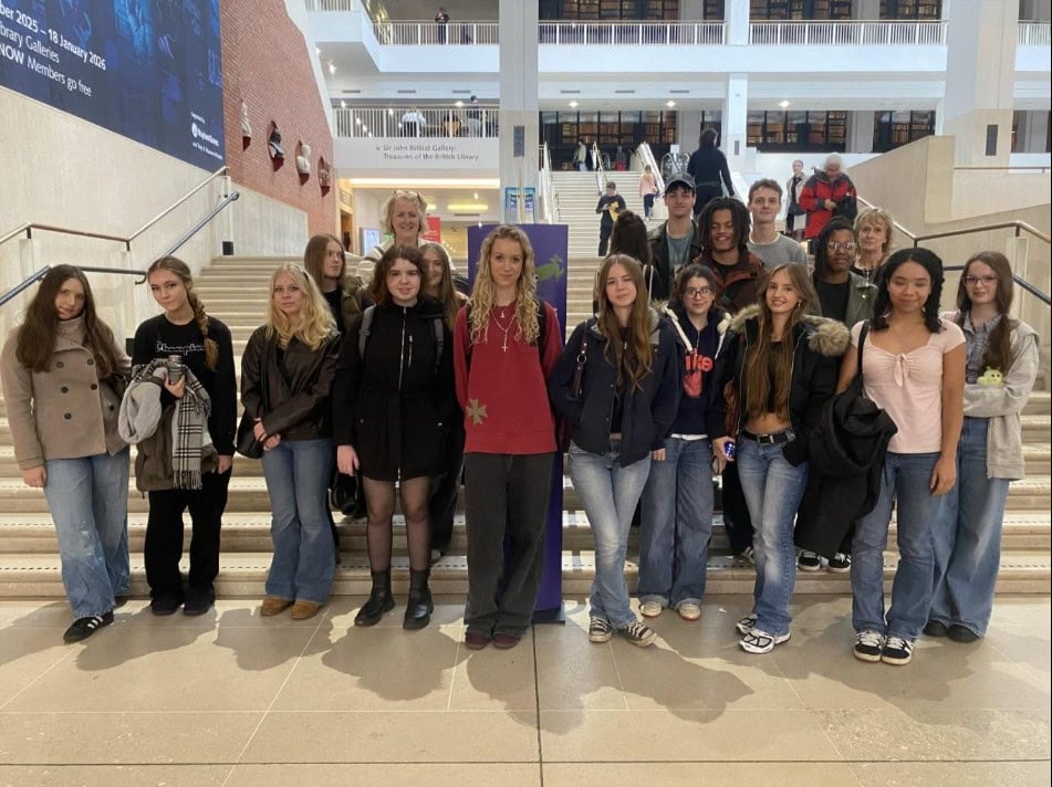Studetnts Standing On Steps Outside The British Library