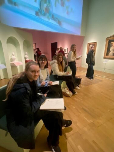 Fashion students sketching at V&A