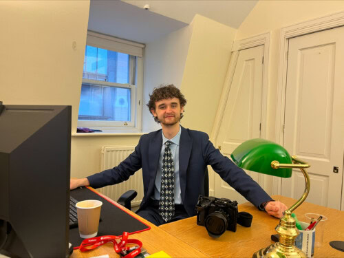 Joe Crabtree at his desk in the Houses of Parliament