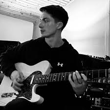 Callum garland playing the guitar