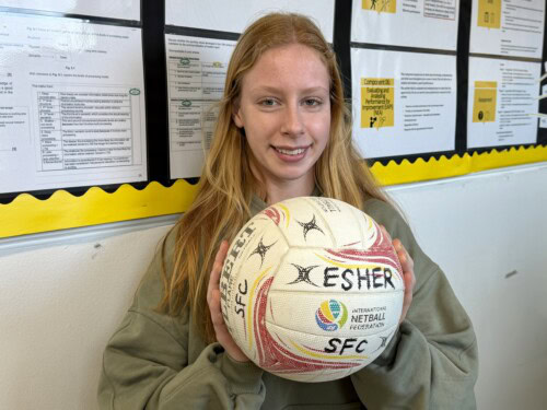 Hattie holding a netball
