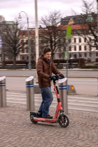 a student riding an ebike in sweden
