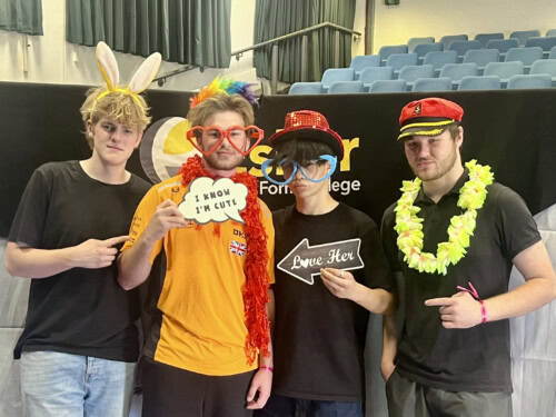 a group of male students in costume at the summer festival