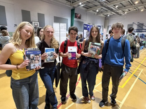 Students with prospectuses