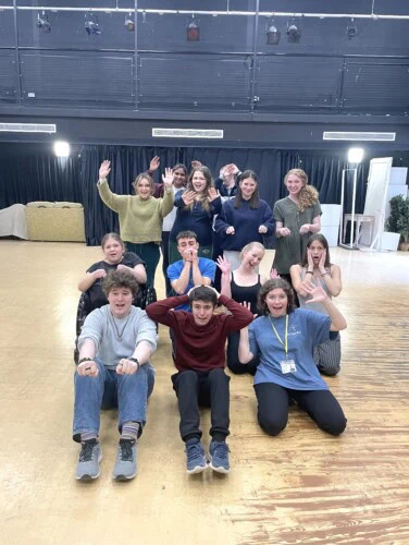 Drama students in the drama studio doing a workshop