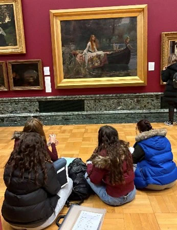 art students drawing in a gallery of renaissance art