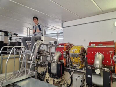 Student On Top Of Machinery