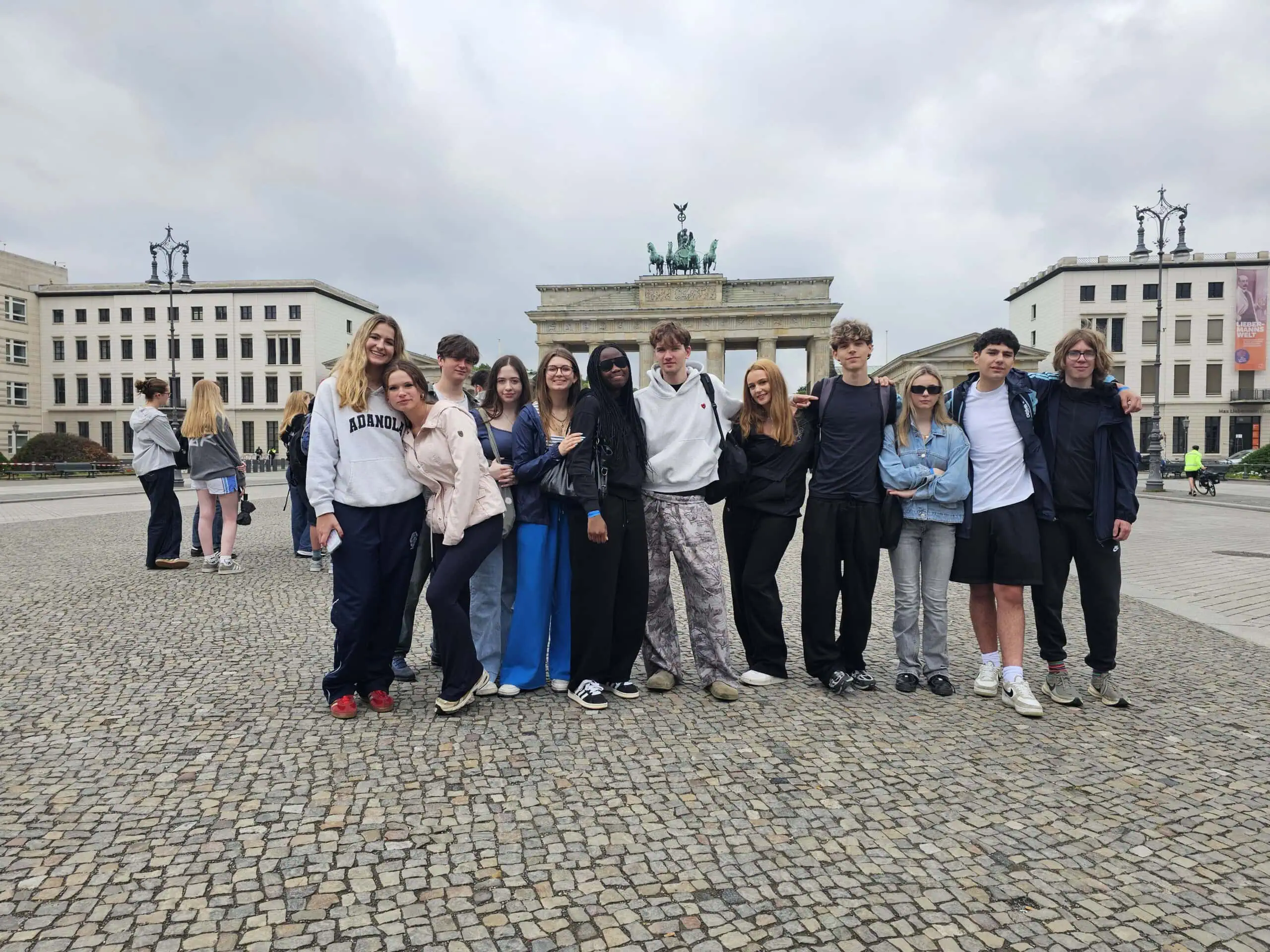students at the brandenburg gate berlin
